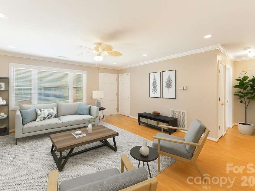 102 Boyd Drive, Flat Rock, NC 28731.  MLS# CAR4291135, YatesRealty ID 7764. Virtually Staged Living Room