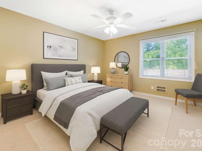 102 Boyd Drive, Flat Rock, NC 28731.  MLS# CAR4291135, YatesRealty ID 7764. Virtually Staged Primary Bedroom