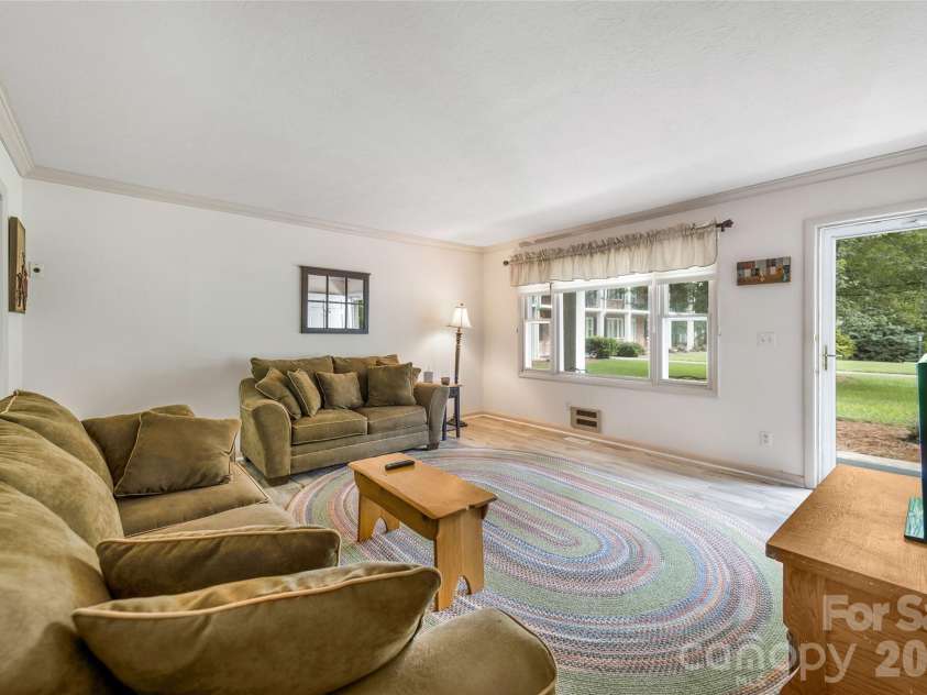 102 Boyd Drive, Flat Rock, NC 28731.  MLS# CAR4424177, YatesRealty ID 7764. Living Room