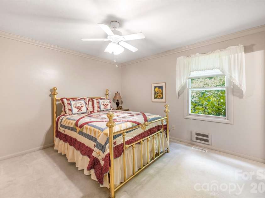102 Boyd Drive, Flat Rock, NC 28731.  MLS# CAR4424177, YatesRealty ID 7764. Primary Bedroom