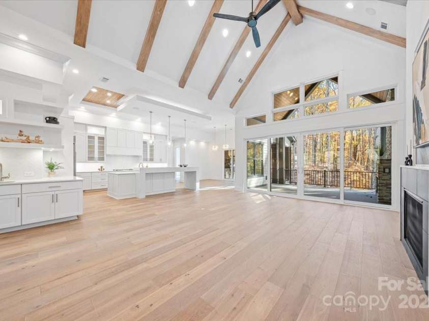 155 Copper Pine Lane, Davidson, NC 28036.  MLS# CAR4055268, YatesRealty ID 778. Great Room into Kitchen