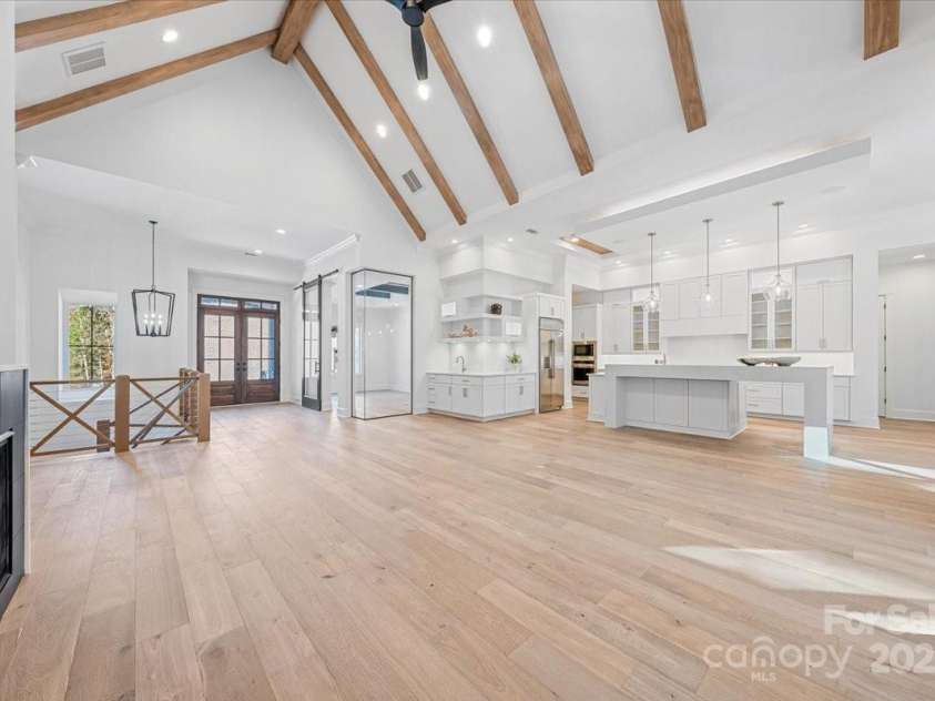 155 Copper Pine Lane, Davidson, NC 28036.  MLS# CAR4055268, YatesRealty ID 778. Great Room towards Foyer