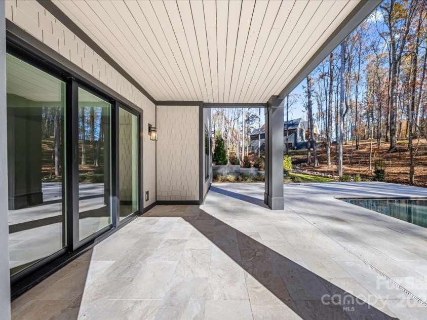 155 Copper Pine Lane, Davidson, NC 28036.  MLS# CAR4055268, YatesRealty ID 778. Lower Level Walkout Porch