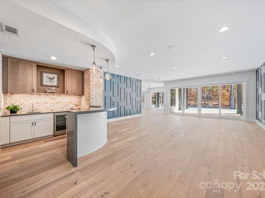 155 Copper Pine Lane, Davidson, NC 28036.  MLS# CAR4055268, YatesRealty ID 778. Lower Level Wet Bar and Rec Room