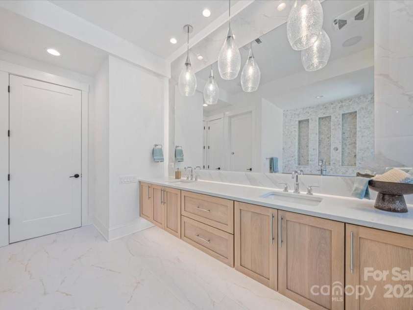 155 Copper Pine Lane, Davidson, NC 28036.  MLS# CAR4055268, YatesRealty ID 778. Owner's Bath - Vanity
