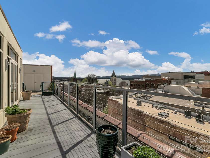 59 College Street, Asheville, NC 28801.  MLS# CAR4306677, YatesRealty ID 7780. Rooftop Patio and Flex/Workspace