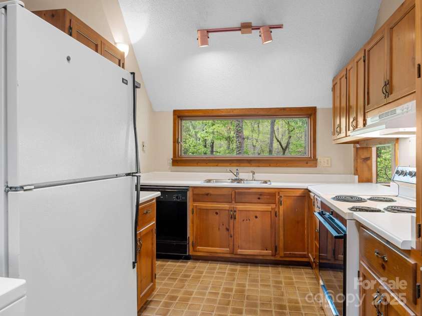 241 Pinefield Drive, Tryon, NC 28782.  MLS# CAR4250675, YatesRealty ID 7781. Apartment kitchen