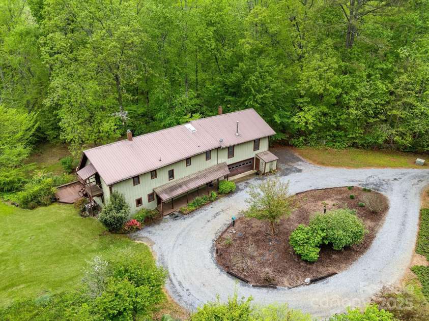 241 Pinefield Drive, Tryon, NC 28782.  MLS# CAR4250675, YatesRealty ID 7781. Circular driveway