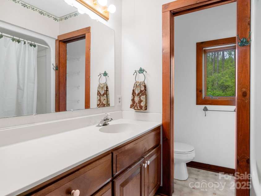 241 Pinefield Drive, Tryon, NC 28782.  MLS# CAR4250675, YatesRealty ID 7781. Full bath on the second floor
