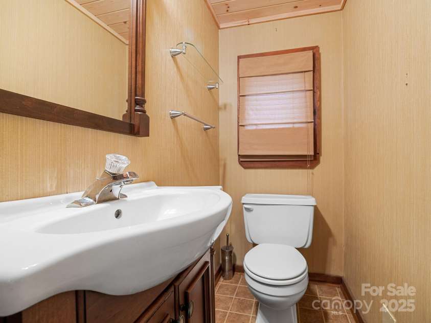 241 Pinefield Drive, Tryon, NC 28782.  MLS# CAR4250675, YatesRealty ID 7781. Power room on the first floor
