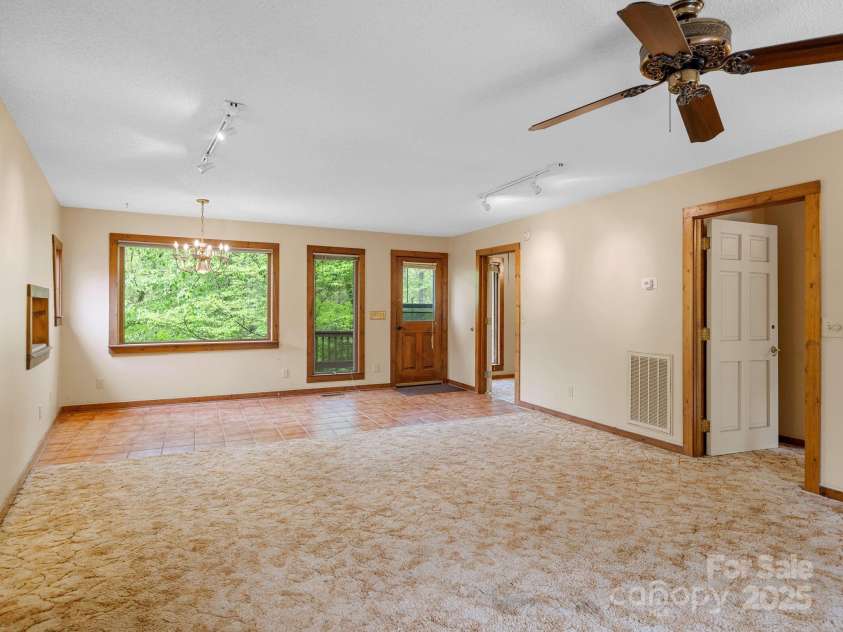 241 Pinefield Drive, Tryon, NC 28782.  MLS# CAR4250675, YatesRealty ID 7781. Two bedroom apartment above the garage