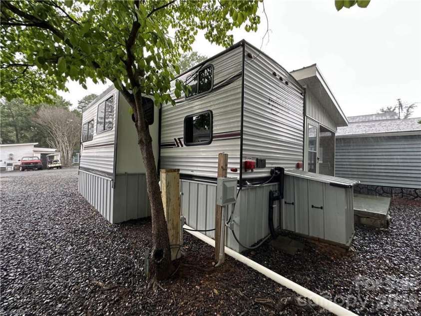 107 Pine Street, New London, NC 28127.  MLS# CAR4361664, YatesRealty ID 7786. 