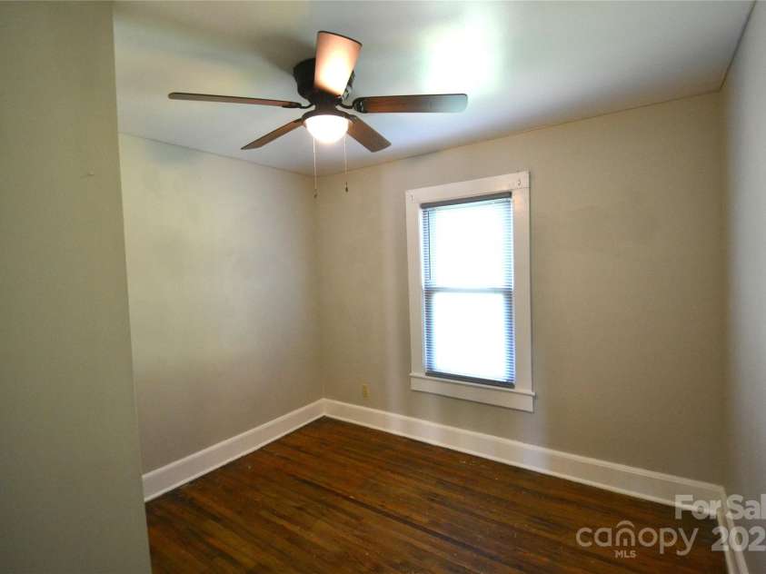 303 Nc Hwy 200 Highway, Stanfield, NC 28163.  MLS# CAR4251106, YatesRealty ID 7786. 2nd Bedroom with Hardwood floors