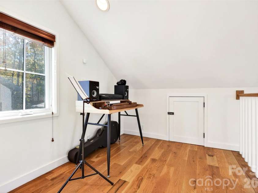 9 Fay Jones Lane, Black Mountain, NC 28711.  MLS# CAR4363162, YatesRealty ID 7788. Loft area