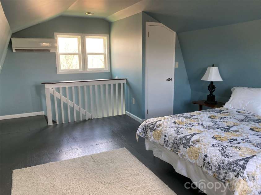 1434 Lake Adger Road, Mill Spring, NC 28756.  MLS# CAR4363547, YatesRealty ID 7791. ADU 2nd fl bedroom