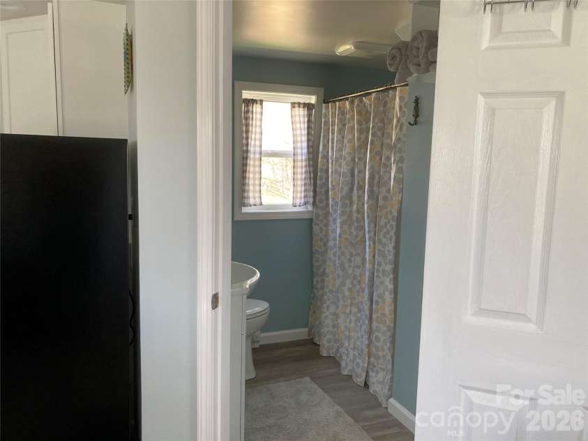 1434 Lake Adger Road, Mill Spring, NC 28756.  MLS# CAR4363547, YatesRealty ID 7791. ADU full bath