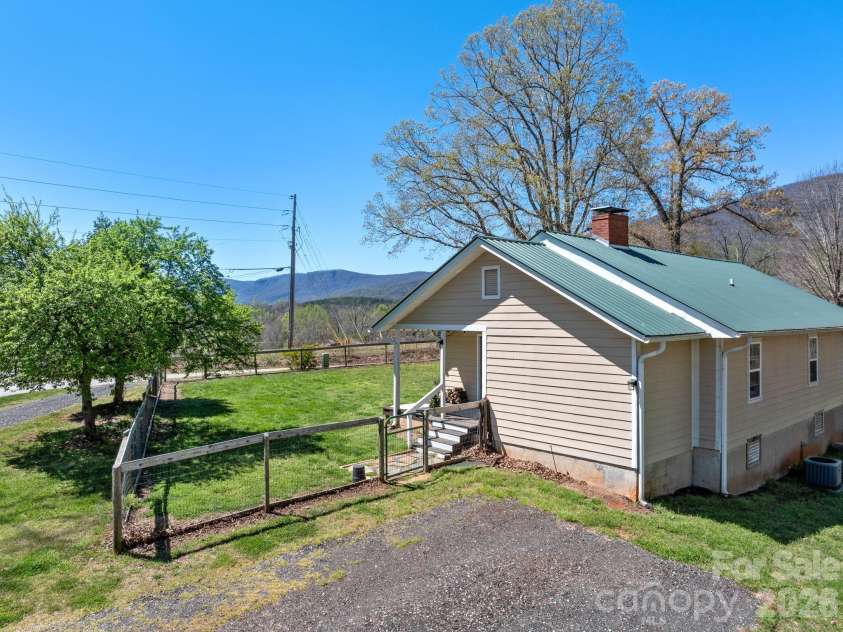 1434 Lake Adger Road, Mill Spring, NC 28756.  MLS# CAR4363547, YatesRealty ID 7791. Appalachian cottage