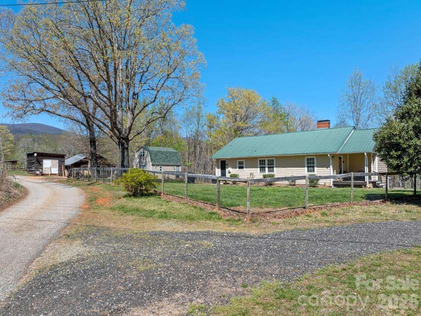 1434 Lake Adger Road, Mill Spring, NC 28756.  MLS# CAR4363547, YatesRealty ID 7791. Cottage
