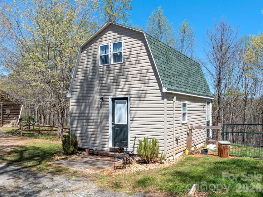 1434 Lake Adger Road, Mill Spring, NC 28756.  MLS# CAR4363547, YatesRealty ID 7791. Guest cottage