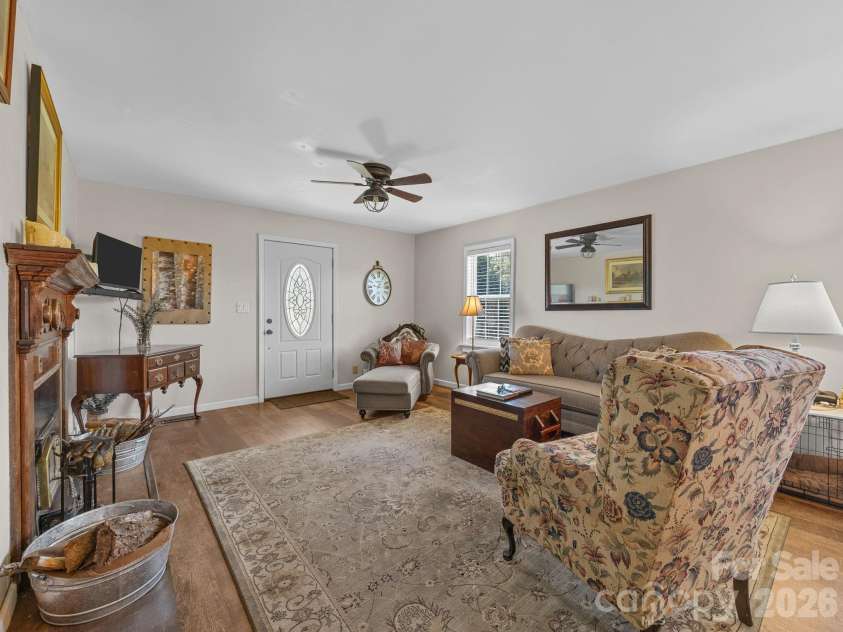 1434 Lake Adger Road, Mill Spring, NC 28756.  MLS# CAR4363547, YatesRealty ID 7791. Living room