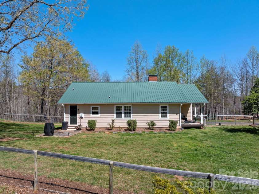 1434 Lake Adger Road, Mill Spring, NC 28756.  MLS# CAR4363547, YatesRealty ID 7791. Main house/cottage