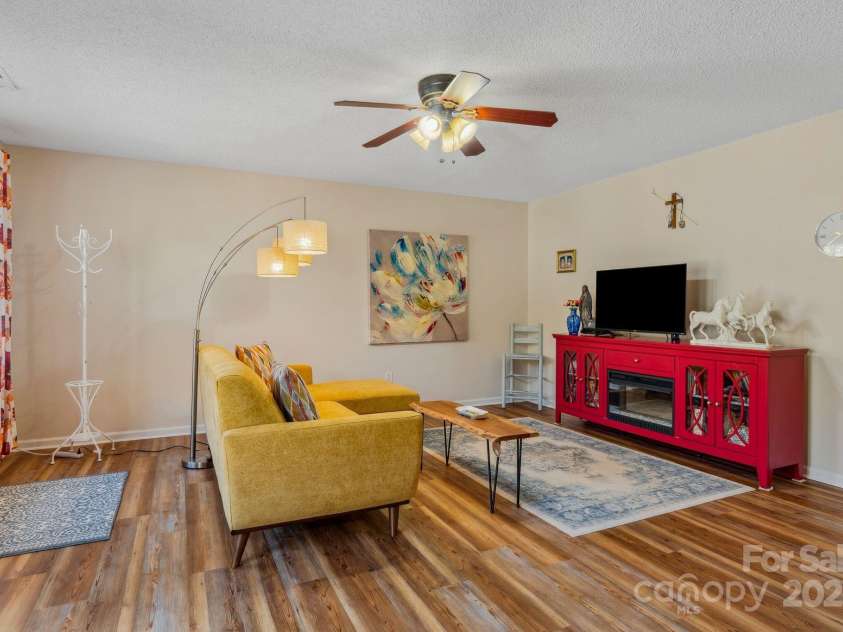 12 Hutchinson Woods Drive, Fletcher, NC 28732.  MLS# CAR4238385, YatesRealty ID 7792. This area is perfect for a formal dining area or a great living area.