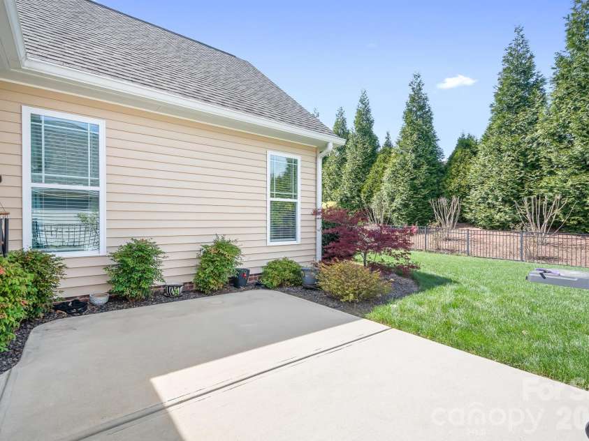 12705 Meetinghouse Drive, Cornelius, NC 28031.  MLS# CAR4350533, YatesRealty ID 7797. Back patio