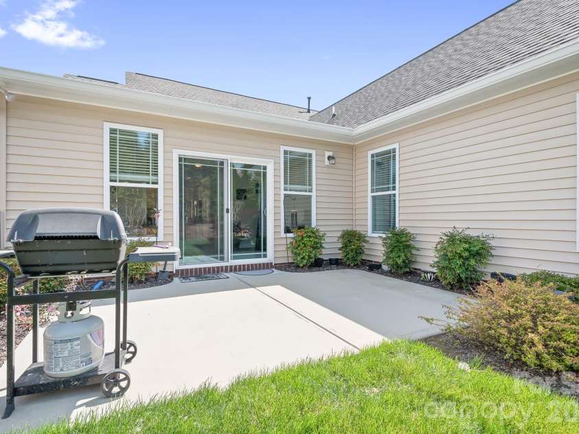 12705 Meetinghouse Drive, Cornelius, NC 28031.  MLS# CAR4350533, YatesRealty ID 7797. Back patio