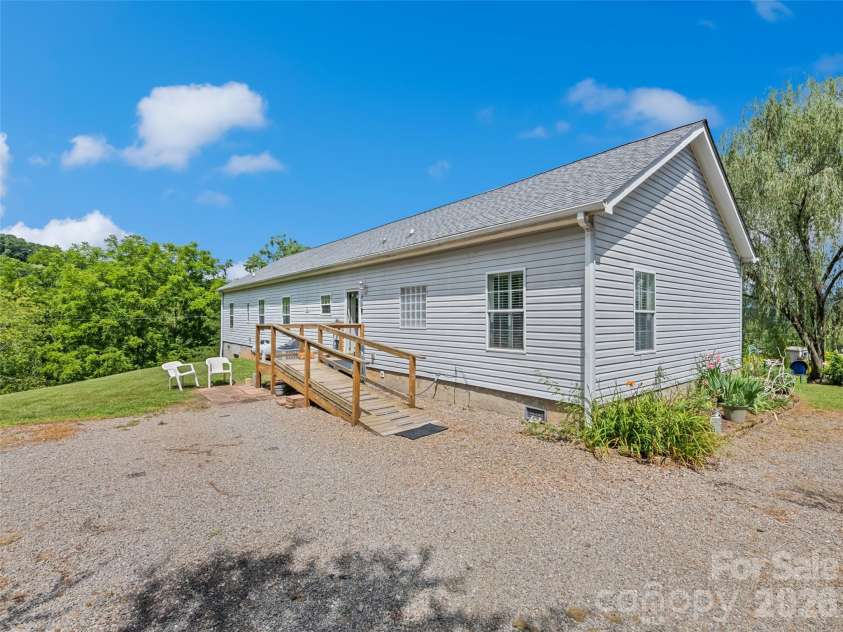 32 Perseverance Drive, Canton, NC 28716.  MLS# CAR4358563, YatesRealty ID 7799. Side entrance w/ramp