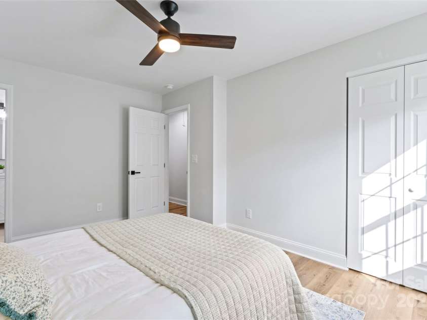 325 Club View Lane, Matthews, NC 28105.  MLS# CAR4238612, YatesRealty ID 7799. Bedroom with en-suite bathroom