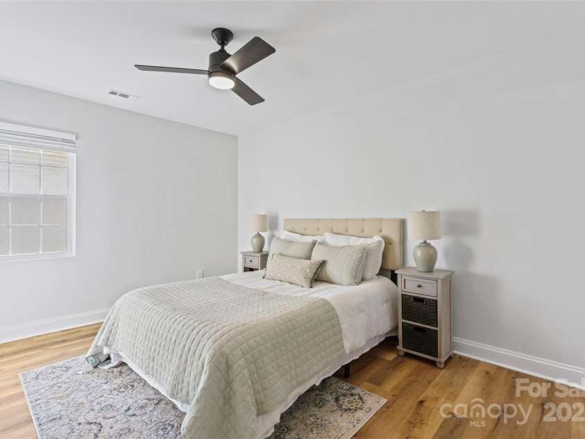 325 Club View Lane, Matthews, NC 28105.  MLS# CAR4238612, YatesRealty ID 7799. Bedroom with en-suite bathroom