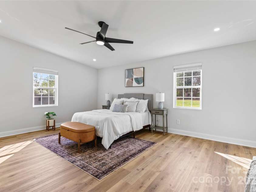 325 Club View Lane, Matthews, NC 28105.  MLS# CAR4238612, YatesRealty ID 7799. Primary bedroom with en-suite bathroom