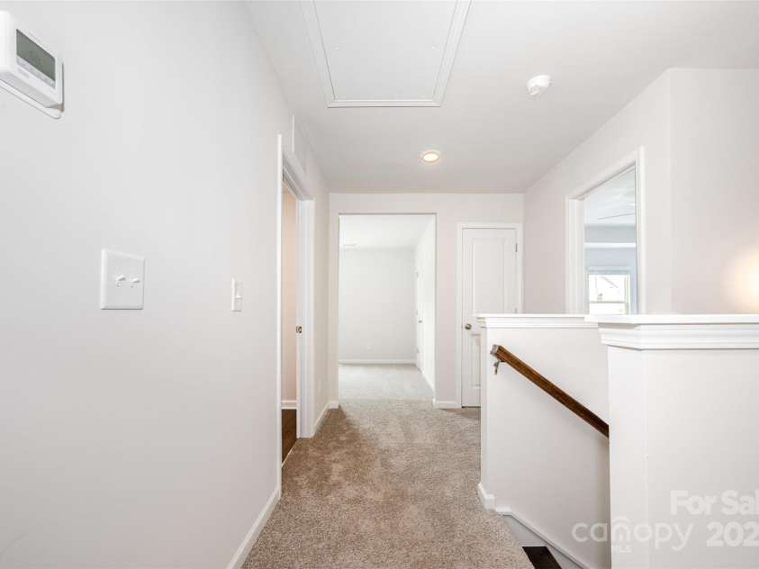 3001 Sadler Woods Lane, Charlotte, NC 28214.  MLS# CAR4272760, YatesRealty ID 781. Desk/Study space off of stairs. Representational Photo.