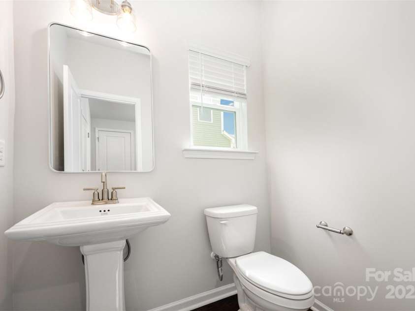 3001 Sadler Woods Lane, Charlotte, NC 28214.  MLS# CAR4272760, YatesRealty ID 781. Half bathroom. Representational Photo.