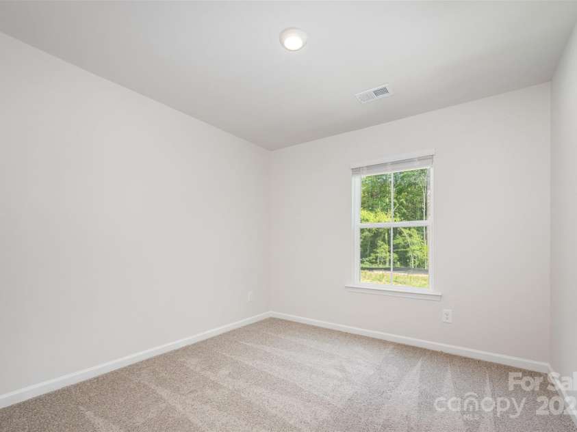 3001 Sadler Woods Lane, Charlotte, NC 28214.  MLS# CAR4272760, YatesRealty ID 781. Spare bedroom 3. Representational Photo.
