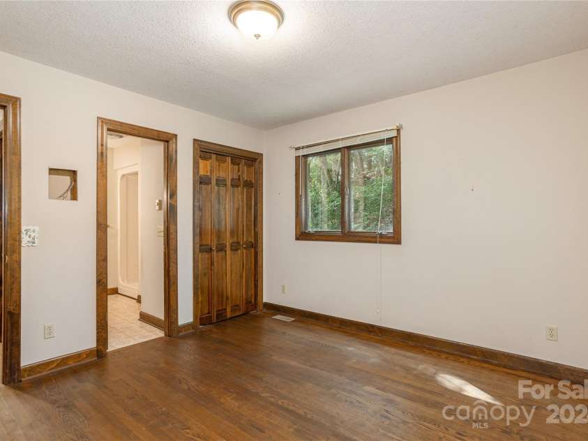 120 Pinewood Circle, Laurel Park, NC 28739.  MLS# CAR4187518, YatesRealty ID 7811. 2nd Bedroom with ensuite bath