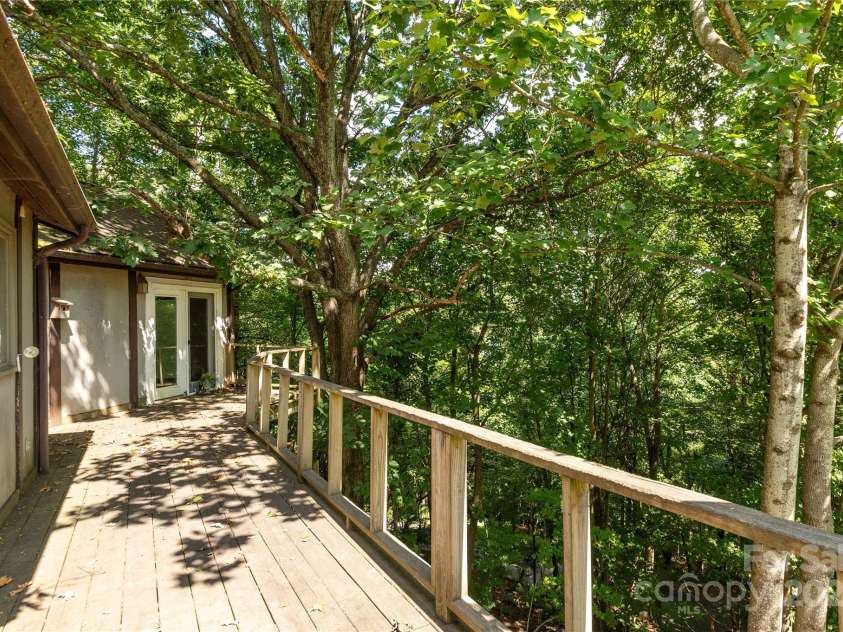120 Pinewood Circle, Laurel Park, NC 28739.  MLS# CAR4187518, YatesRealty ID 7811. Decking off Main Level
