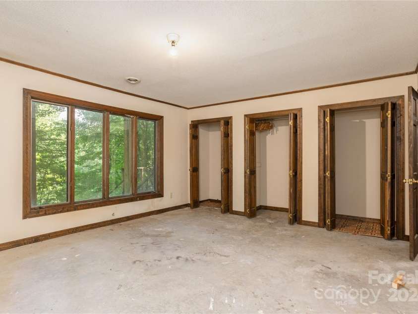 120 Pinewood Circle, Laurel Park, NC 28739.  MLS# CAR4187518, YatesRealty ID 7811. Lower Level Bedroom (as spacious as primary!!)