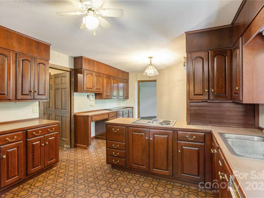 120 Pinewood Circle, Laurel Park, NC 28739.  MLS# CAR4187518, YatesRealty ID 7811. Original Cherry Cabinets