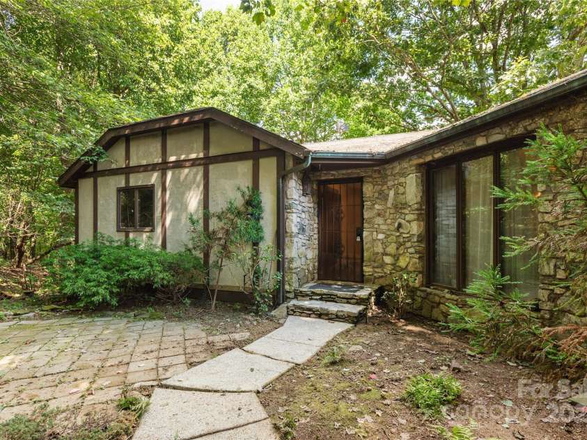 120 Pinewood Circle, Laurel Park, NC 28739.  MLS# CAR4187518, YatesRealty ID 7811. Stone Facade at Front Door