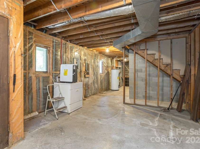 120 Pinewood Circle, Laurel Park, NC 28739.  MLS# CAR4187518, YatesRealty ID 7811. Unfinished Area (second laundry location)