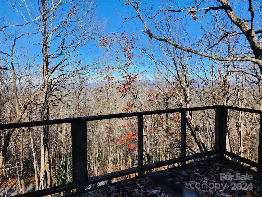 120 Pinewood Circle, Laurel Park, NC 28739.  MLS# CAR4187518, YatesRealty ID 7811. Winter Views from Primary BR Deck