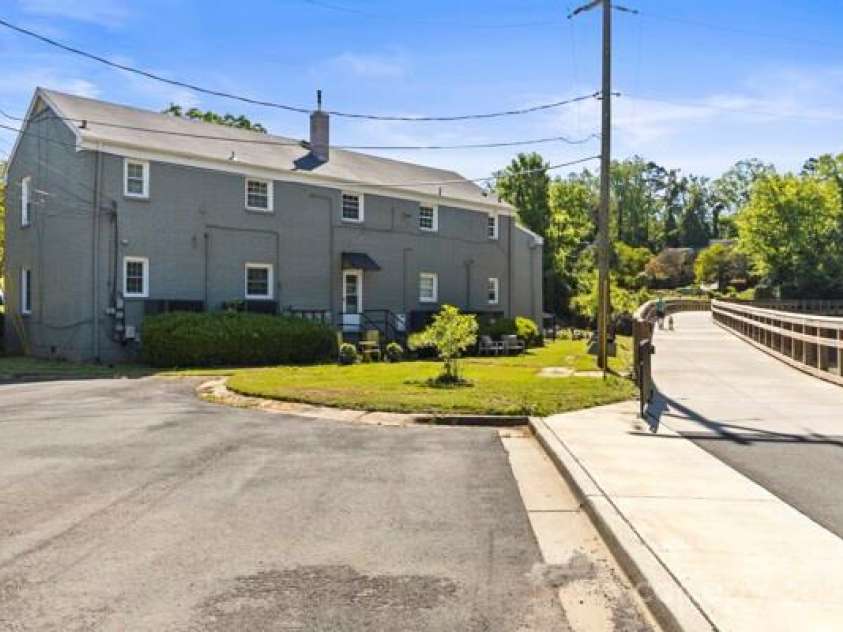 241 Wakefield Drive, Charlotte, NC 28209.  MLS# CAR4248262, YatesRealty ID 7816. Back of building 241 Where there are parking spots for this building