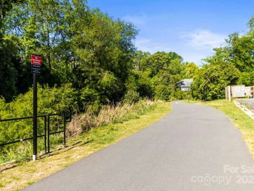 241 Wakefield Drive, Charlotte, NC 28209.  MLS# CAR4248262, YatesRealty ID 7816. Greenway towards Park Rd Shopping Center, not far around the curve