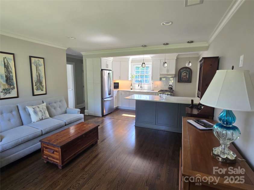 241 Wakefield Drive, Charlotte, NC 28209.  MLS# CAR4248262, YatesRealty ID 7816. Kitchen expanded and opened to the living room