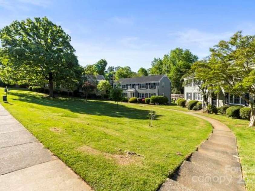 241 Wakefield Drive, Charlotte, NC 28209.  MLS# CAR4248262, YatesRealty ID 7816. Walk way from the Parking spaces out front