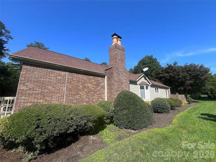 108 Glenbrook Drive, Hendersonville, NC 28739.  MLS# CAR4363228, YatesRealty ID 7817. End Unit Adjoining Greenspace