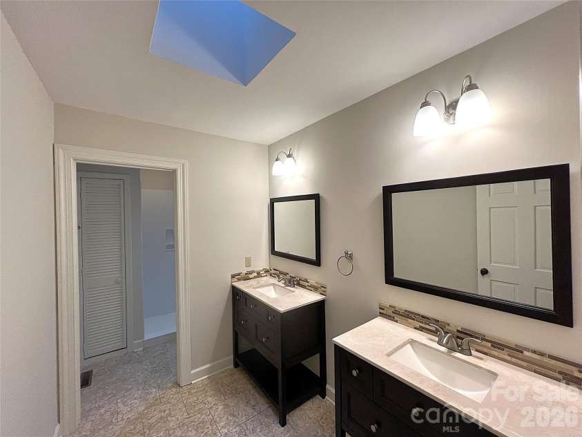 108 Glenbrook Drive, Hendersonville, NC 28739.  MLS# CAR4363228, YatesRealty ID 7817. Master Bathroom with Two Vanities