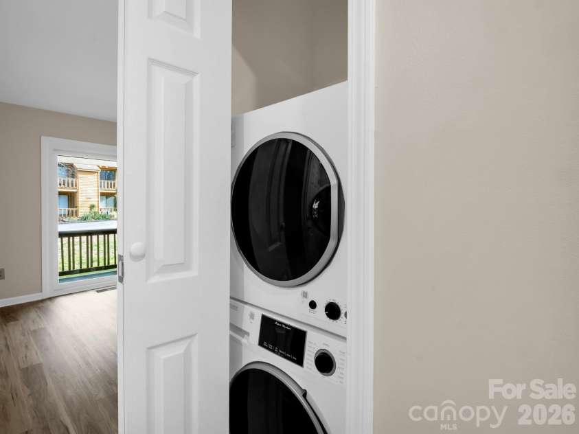 520 Courtwood Lane, Hendersonville, NC 28739.  MLS# CAR4399411, YatesRealty ID 7826. Stack Laundry Closet