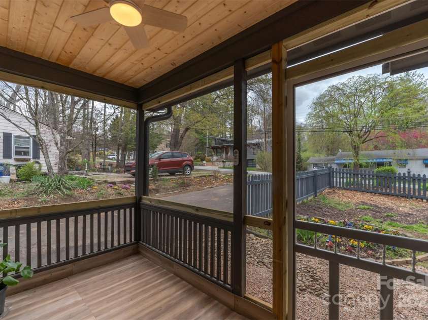 605 Rhododendron Avenue, Black Mountain, NC 28711.  MLS# CAR4242115, YatesRealty ID 7827. Screened in Front Porch